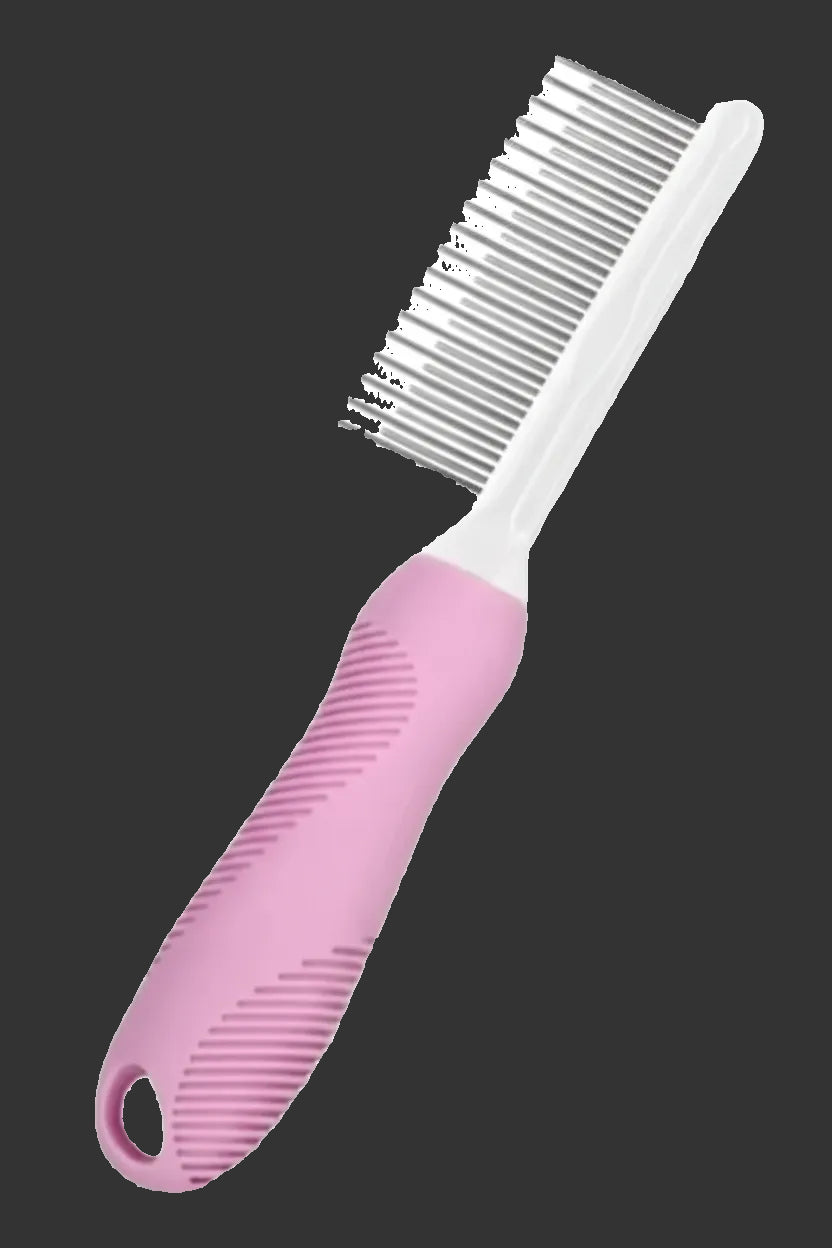 Pink pet comb with white handle on a white background
